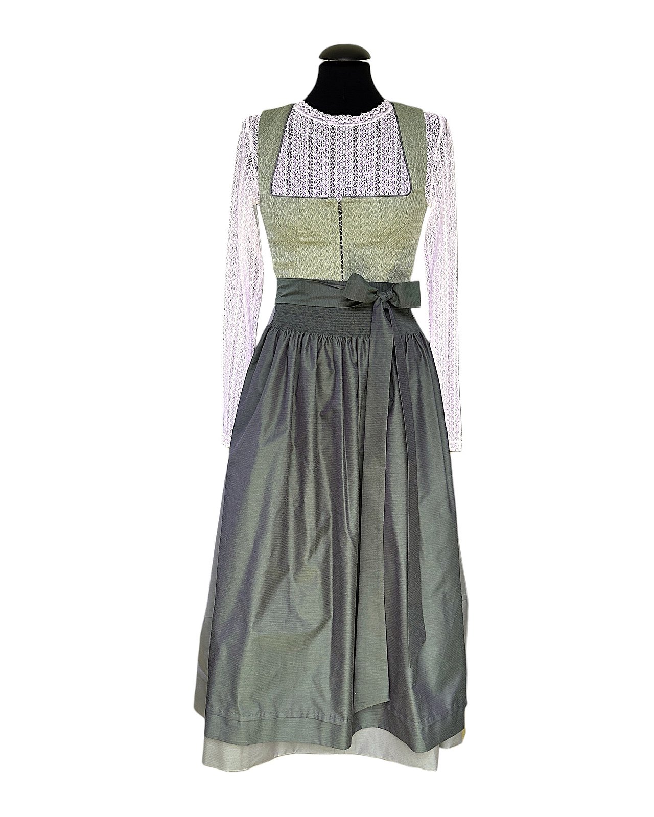 Modernes, stilvolles Dirndl in verschiedenen Grüntönen